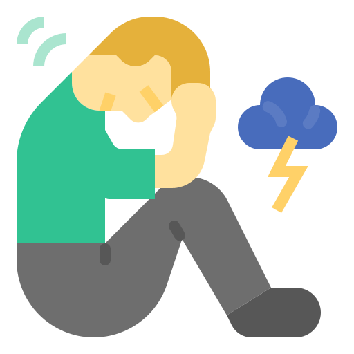 man sitting sad and depressed with a cloud next to him